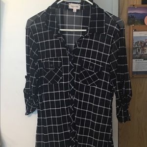 Blue and white button up shirt.